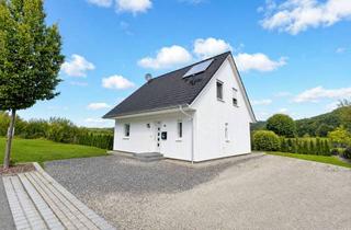 Einfamilienhaus kaufen in 97514 Oberaurach, KAPITALANLAGE: GEPFLEGTES EINFAMILIENHAUS MIT GROSSEM GARTEN UND ZUVERLÄSSIGEN MIETERN