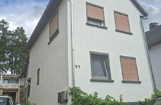Haus kaufen in 35444 Biebertal, Biebertal - 2Häuser auf einem Grunstück in Rodheim Biebertal