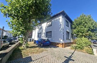 Haus kaufen in 64331 Weiterstadt, Haus mit 2 Eigentumswohnungen und großem Garten