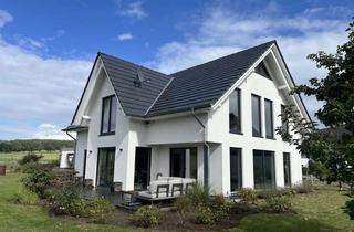 Haus kaufen in 21388 Soderstorf, Exklusives Wohnen mit Weitblick – neuwertiges Designhaus in Feldrandlage