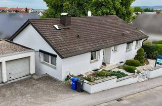 Haus kaufen in 64354 Reinheim, Außergewöhnlicher Bungalow mit repräsentativen Wohnbereichen und gepflegter Außenanlage
