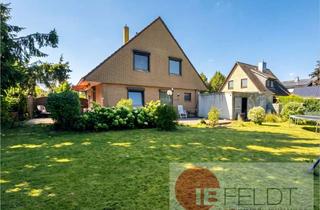 Einfamilienhaus kaufen in 21502 Geesthacht, Charmantes Einfamilienhaus mit guter Raumaufteilung, Doppelgarage und großem Garten mit Terrasse