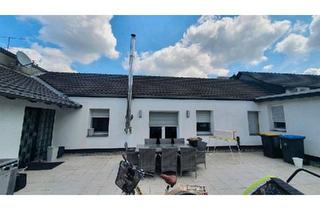 Haus kaufen in 46537 Dinslaken, Dinslaken - Bungalow mit Gewerbe