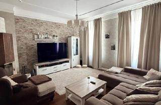 Wohnung kaufen in 31789 Hameln, Hameln - Charmante 3-Zimmer-Altbauwohnung mit Balkon und Kamin