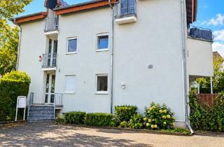 Wohnung kaufen in 64572 Büttelborn, Außergewöhnliche 2-Zimmer Dachgeschosswohnung mit Südbalkon