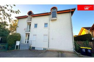 Wohnung kaufen in 64572 Büttelborn, Außergewöhnliche 2-Zimmer Dachgeschosswohnung mit Südbalkon