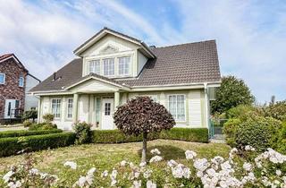 Einfamilienhaus kaufen in 23743 Grömitz, Attraktives Einfamilienhaus in Feldrandlage mit Garage