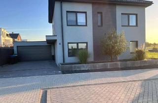 Wohnung mieten in 41812 Erkelenz, Exklusive 2-Zimmer-Erdgeschosswohnung mit großzügiger Terrasse, Garten und Doppelgarage