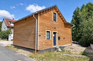 Haus kaufen in 38685 Langelsheim, Kompaktes, modernes Blockhaus (Erstbezug) ca. 93,40 m² Wohnfläche mit Garten in Wolfshagen
