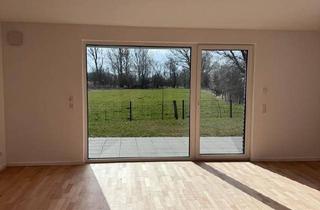 Wohnung kaufen in 23758 Oldenburg, Oldenburg in Holstein - Großzügige 3-Zimmer-Wohnung mit Terrasse und Garten