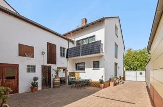 Einfamilienhaus kaufen in 67159 Friedelsheim, Friedelsheim - Modernisiertes Einfamilienhaus mit großzügigen Anbauten und ca. 180 m² Wohnfläche direkt am Wingert