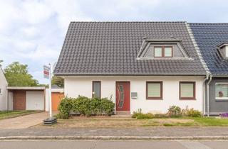 Doppelhaushälfte kaufen in 24539 Wittorf, Wohnen mit Charme & Zukunft – energetisch modernisierte Doppelhaushälfte