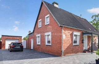 Haus kaufen in 26826 Weener, Für kleines Geld zum Eigenheim - Renov. DHH mit neuer Garage, überd. Terrasse und schönen Garten