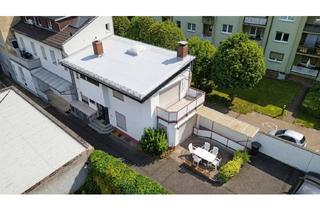 Einfamilienhaus kaufen in 64283 Darmstadt, Einfamilienhaus in der Darmstädter Innenstadt mit Carport, Außenstellplätzen und Kamin