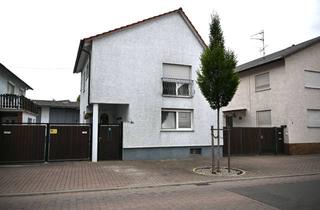Einfamilienhaus kaufen in 68647 Biblis, Kaufpreis auf Anfrage Einfamilienhaus mit großer Scheune und vermieteten Parkplätzen