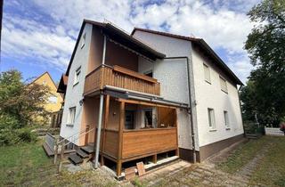 Haus kaufen in 90607 Rückersdorf, Zweifamilienhaus mit großem Nebengebäude und optionalem Baugrundstück