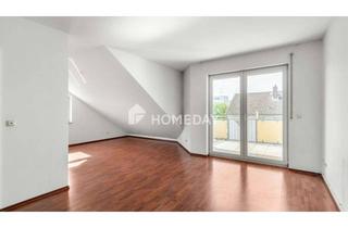 Wohnung kaufen in 63110 Rodgau, Über den Dächern wohnen – helle Dachgeschosswohnung mit Balkon und TG-Stellplatz