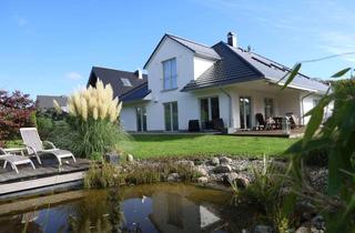 Einfamilienhaus kaufen in 23570 Travemünde, Hochwertiges Einfamilienhaus mit zwei Wohneinheiten und Südwestgarten – nur 800 m zur Ostsee