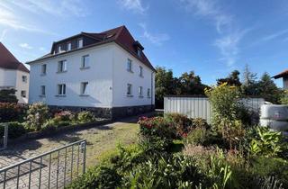 Anlageobjekt in 01477 Arnsdorf, Gepflegtes Mehrfamilienhaus mit vier Wohneinheiten und großem Garten