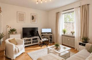 Wohnung kaufen in 40215 Friedrichstadt, Urbanes Wohnen mit Garten – vermietete Altbauwohnung direkt am Fürstenplatz