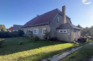 Doppelhaushälfte kaufen in 18196 Dummerstorf, renovierungsbedürftige Doppelhaushälfte mit ca. 1.177 m² Grundstück, Stall und Garage