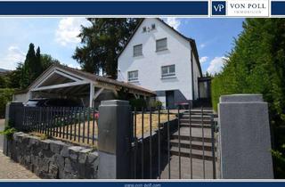 Einfamilienhaus kaufen in 65760 Eschborn, Schön saniertes, großzügiges Einfamilienhaus mit Kamin und sonnigem Garten