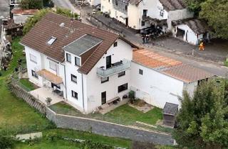 Haus kaufen in 56237 Alsbach, Großzügig wohnen oder clever investieren - Dreifamilienhaus mit attraktiver Stellplatzsituation