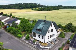 Einfamilienhaus kaufen in 35415 Pohlheim, Ihr Zuhause am Feldrand – Großzügiges Einfamilienhaus mit Einliegerwohnung