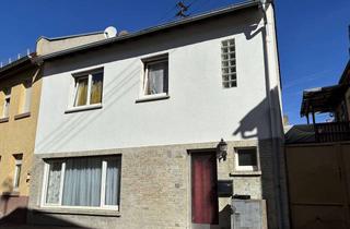 Einfamilienhaus kaufen in 55411 Bingen, Vielseitiges Einfamilienhaus in Bingen-Büdesheim mit Garten, Garage & Stellplätzen
