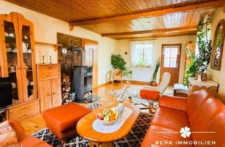 Einfamilienhaus kaufen in 63939 Wörth, BERK Immobilien – Wohnen mit Urlaubsfeeling: Gemütliches Einfamilienhaus mit idyllischem Garten in W