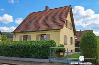 Einfamilienhaus kaufen in 63939 Wörth, BERK Immobilien – Wohnen mit Urlaubsfeeling: Gemütliches Einfamilienhaus mit idyllischem Garten in W