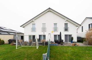 Doppelhaushälfte kaufen in 55459 Grolsheim, Moderne vermietete Doppelhaushälfte mit Garten und effizienter Haustechnik in Grolsheim