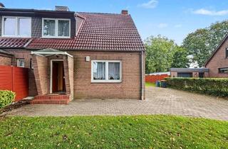 Haus kaufen in 24536 Einfeld, Gepflegte Finnenhaushälfte mit Charme und schönem Grundstück in Einfeld