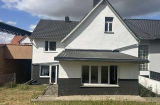 Doppelhaushälfte kaufen in 34277 Fuldabrück, Fuldabrück-Bergshausen: Sanierte Doppelhaushälfte mit ca. 203 m² Wohnfläche und Garten!