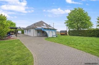 Einfamilienhaus kaufen in 25578 Neuenbrook, Wohnen mit Weitblick - gepflegtes Einfamilienhaus mit Sauna