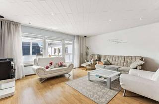 Wohnung kaufen in 35510 Butzbach, Top gepflegte 4-Zimmerwohnung mit 2 Loggien + eigenem Gartenanteil