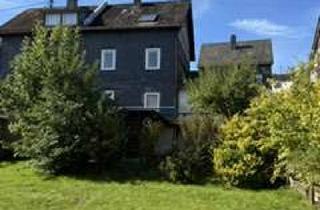 Wohnung kaufen in 57078 Siegen, Wilnsdorf Oberdielfen, solide DHH ca. 100m² Wfl, Keller, Garage in guter Lage