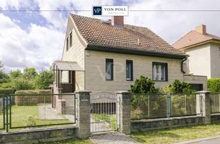 Einfamilienhaus kaufen in 14624 Dallgow-Döberitz, Einfamilienhaus mit Garage auf großzügigem Sonnengrundstück!