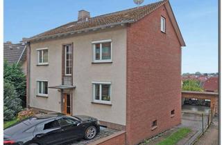 Haus kaufen in 34270 Schauenburg, 2-Familienhaus mit Doppelgarage in guter Lage von Schauenburg