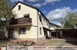 Haus kaufen in 63796 Kahl, Teilvermietetes Zweifamilienhaus mit Carport, Terrasse & Balkon in ruhiger Lage von Kahl am Main
