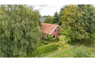 Haus kaufen in 26802 Moormerland, Charakterstarkes Fehnhaus in naturbelassenem Grün