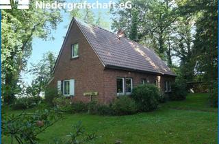 Einfamilienhaus kaufen in 49843 Uelsen, Sanierungsbedürftiges Einfamilienhaus mit großem Grundstück in Uelsen