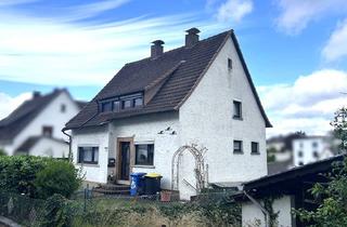 Einfamilienhaus kaufen in 35236 Breidenbach, Breidenbach: Siedlungshaus mit großem Garten