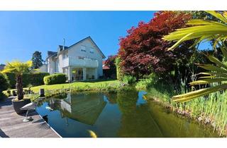 Wohnung kaufen in 46485 Wesel, Wesel - Gehobene Eigentumswohnung mit. Schwimmteich, Garten, Wintergarten