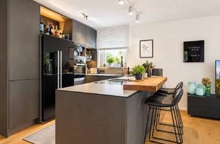 Wohnung kaufen in 85521 Ottobrunn, Exklusive 4-Zimmer-Gartenwohnung mit großem Privatgarten und attraktivem Souterrain