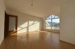 Wohnung kaufen in 72189 Vöhringen, Schöne und helle Dachgeschosswohnung mit Dachbalkon und Carport