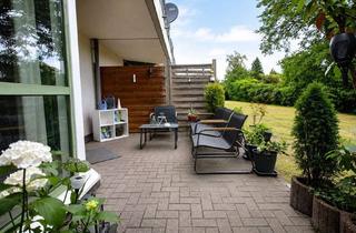 Wohnung kaufen in 40724 Hilden, Modernisiertes Wohnen im Grünen: Ruhige 2-Zimmer-Gartengeschosswohnung mit TG-Stellplatz