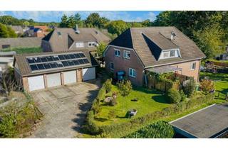 Wohnung kaufen in 24635 Rickling, Wohnen wie im eigenen Haus: schöne Erdgeschosswohnung mit Garten, Terrasse & Garage in ruhiger Lage