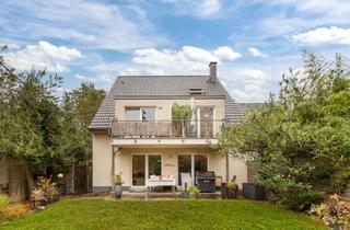 Mehrfamilienhaus kaufen in 40468 Unterrath, Gepflegtes Mehrfamilienhaus mit durchdachtem Maisonette-Konzept und großem Garten