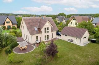 Haus kaufen in 17375 Mönkebude, Stilvoll & energieeffizient: Freistehendes Familiendomizil nahe dem Stettiner Haff